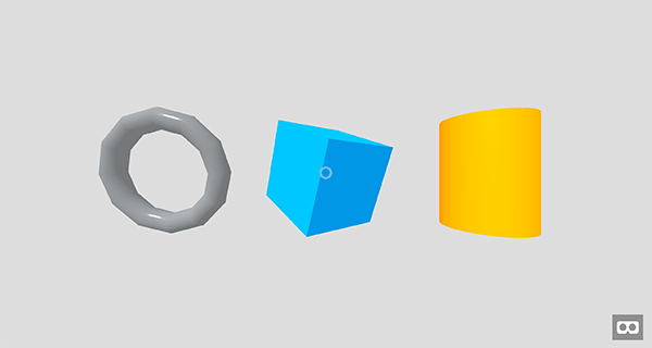 An illustration of 3D representation of three different geometry shapes displayed on a grey background: the first one is a darker grey torus, the second is a blue cube and the last one is a yellow cylinder.